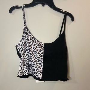 Black and white crop tank with cheetah print on left side